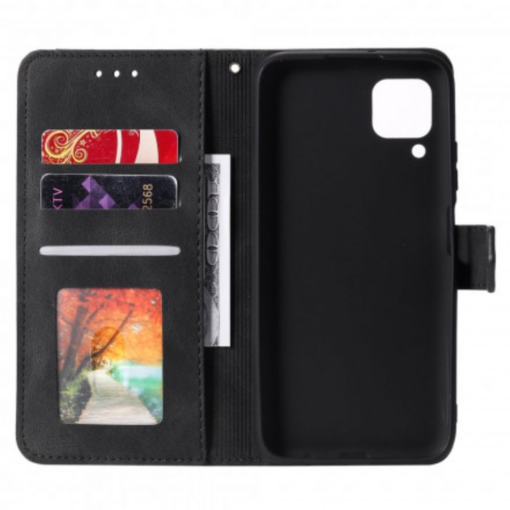 Folio-hoesje voor Samsung Galaxy A12 / M12 Tweekleurige Klinknagels Van Kunstleer